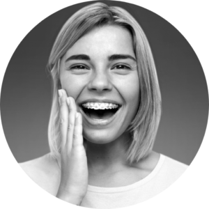teenage girl with braces smiling
